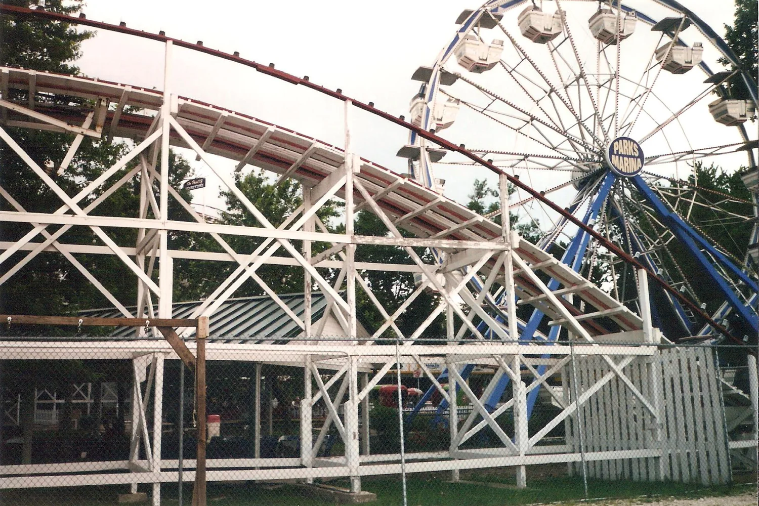 The wooden roller coaster and Ferris wheel at Arnolds Park.